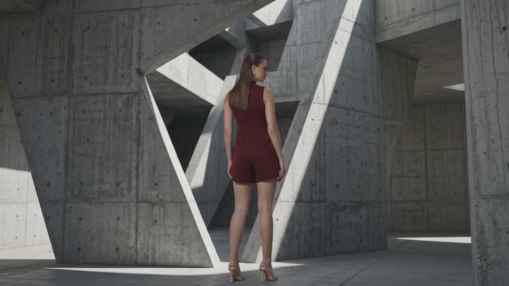 Woman wearing a burgundy dress against a gray background. Winery Mermaid Skort Dress
